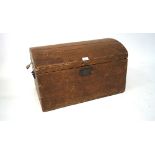 A early 20th century dome topped trunk, with handles to either side,