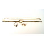 An assortment of gold jewellery,