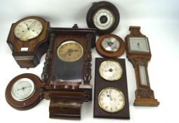 An assortment of 20th century wall clocks and barometers,