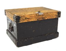 A 20th century pine travelling trunk, of rectangular form, the lower section painted black,