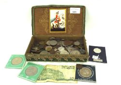 An assortment of vintage coins, mostly European,