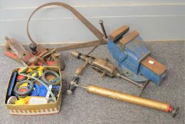 A assorment of tools to include a vice