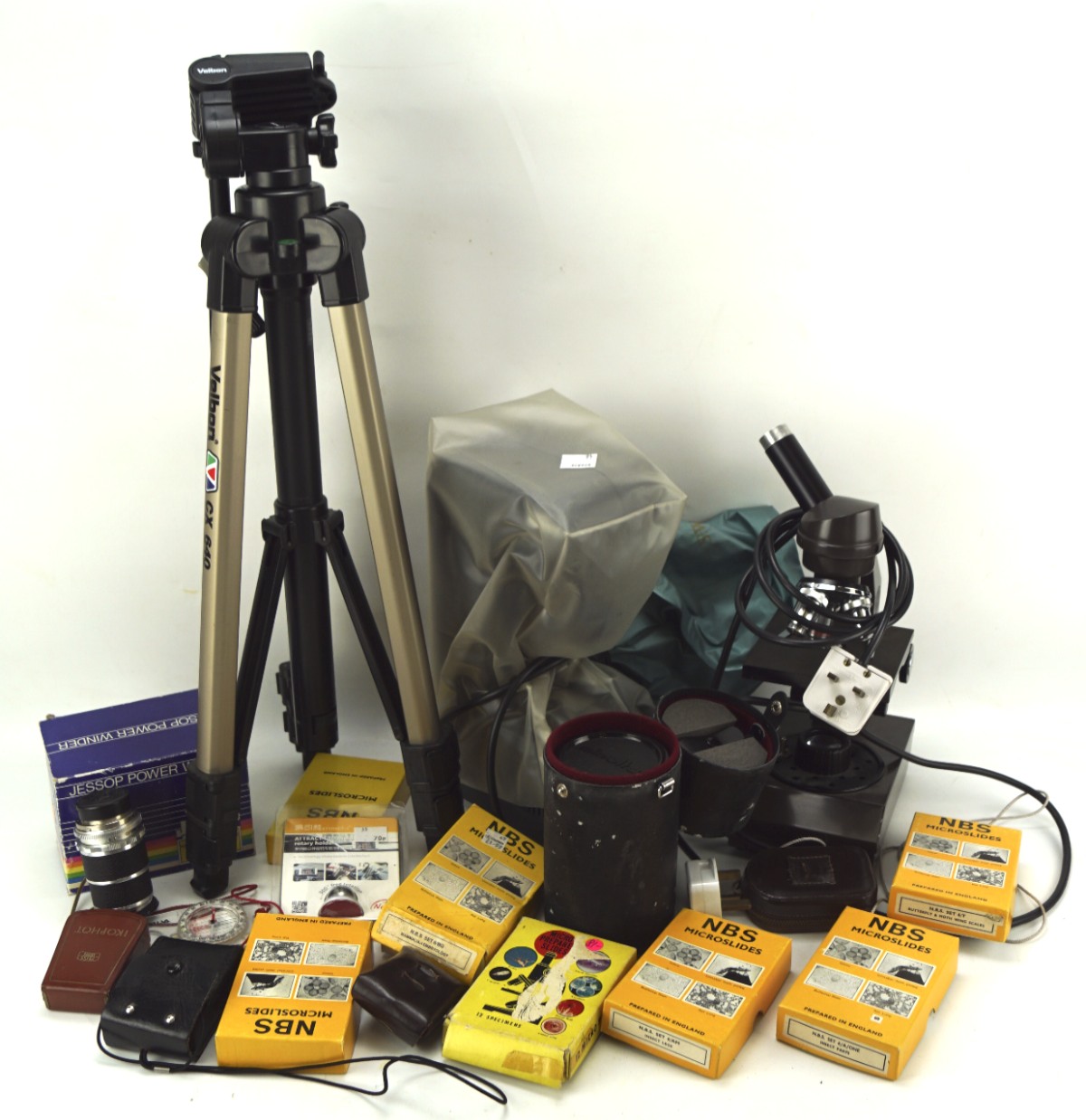 An assortment of cameras and related equipment, including a Voigtlander Super-dynarex 1:4/135 lens,