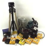 An assortment of cameras and related equipment, including a Voigtlander Super-dynarex 1:4/135 lens,