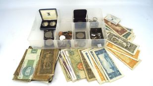 A collection of coins, mostly European examples,