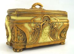 An Art Noveau lidded box, of rectangular form with gilt decoration and a handle to the top,