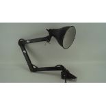 A mid-century black painted anglepoise style desk lamp, with black enamel shade,