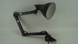 A mid-century black painted anglepoise style desk lamp, with black enamel shade,