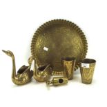 Assorted brassware, including a Middle Eastern embossed tray and two similar beakers,