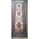 A 20th century floor rug runner,