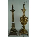 Two contemporary brass lamps, one of columnal form mounted on a square base,