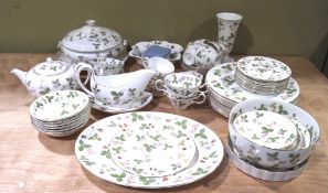 A Wedgwood part tea and dinner service in the 'Wild Strawberry' pattern, including tureens, plates,