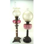 Two late 19th-early 20th century oil lamps,
