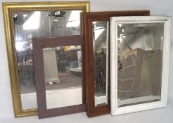 Four wall mirrors, two being gilt framed,