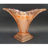 An Art deco style peach coloured glass trumpet flower vase, with interior stem holder,