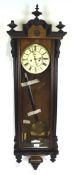An early 20th century mahogany housed Vienna wall clock,
