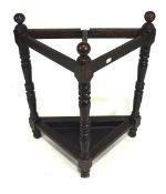 An early/mid-20th century oak umbrella/stickstand, of triangular form, with original metal tray,