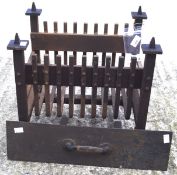 An early 20th century cast iron fire grate,