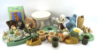 A large collection of Sylvac, including a pair of swan vases no.4393, a blue glazed dog no.