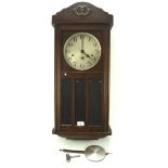 An early 20th century mahogany cased wall clock, silvered dial with Arabic numerals,