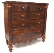 A Victorian mahogany veneered chest of two short over three long graduating drawers,