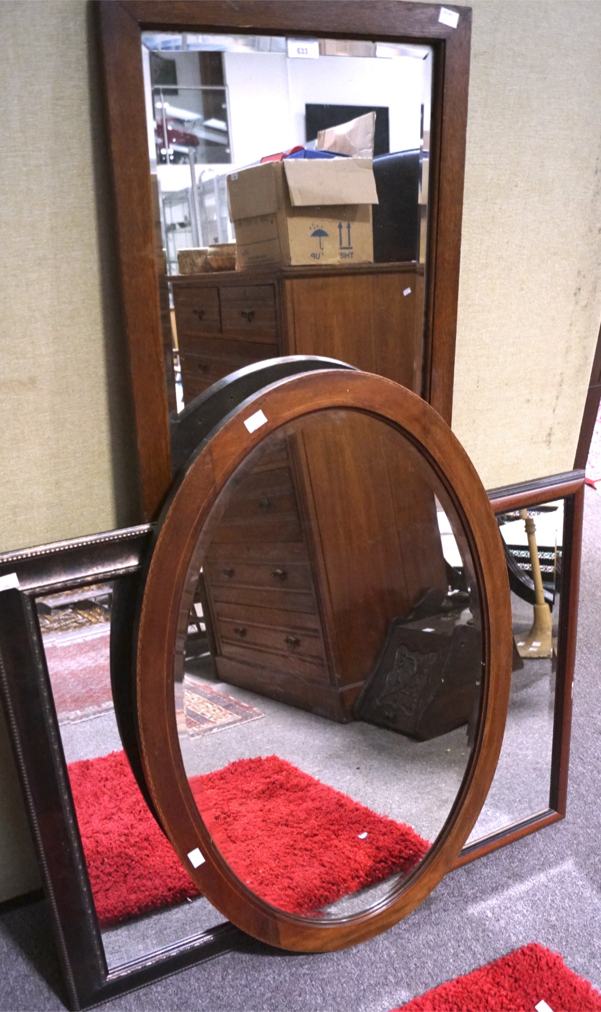 An assortment of mirrors, various sizes,