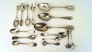 An assortment of silver flatware, including a William IV table spoon,