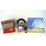 An assortment of collectables, including badges, a Philips Radio, 1970 World Cup Coin Collection,