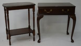 Two stained oak tables, one having a single long drawer to the front, raised upon cabriole supports,