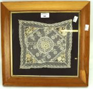 A late 19th century lace white work and needlework panel approximately 24cm x 23cm,