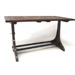 An industrial adapted oak and teak dining table, of rectangular form,