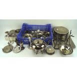 An assortment of silver plate, including flatware, a pair of candlesticks, coasters,