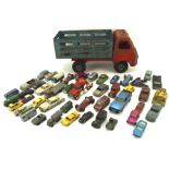 An assortment of vintage diecast vehicles, including examples by Corgi and Dinky,