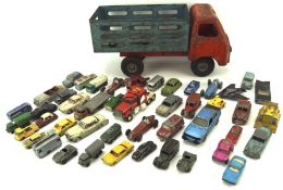 An assortment of vintage diecast vehicles, including examples by Corgi and Dinky,