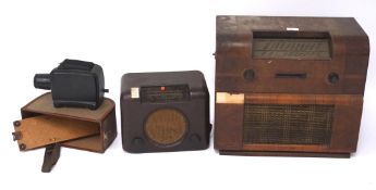 Two mid-century radios and an Agfa opticus 100 projector, one radio by Bush, in a bakelite case,