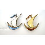 Two vintage Norweigan silver David Anderson enamel brooches, in the form of sailing boats,