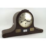 An early 20th century oak cased mantel clock by Junghans,