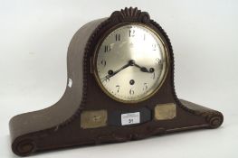 An early 20th century oak cased mantel clock by Junghans,