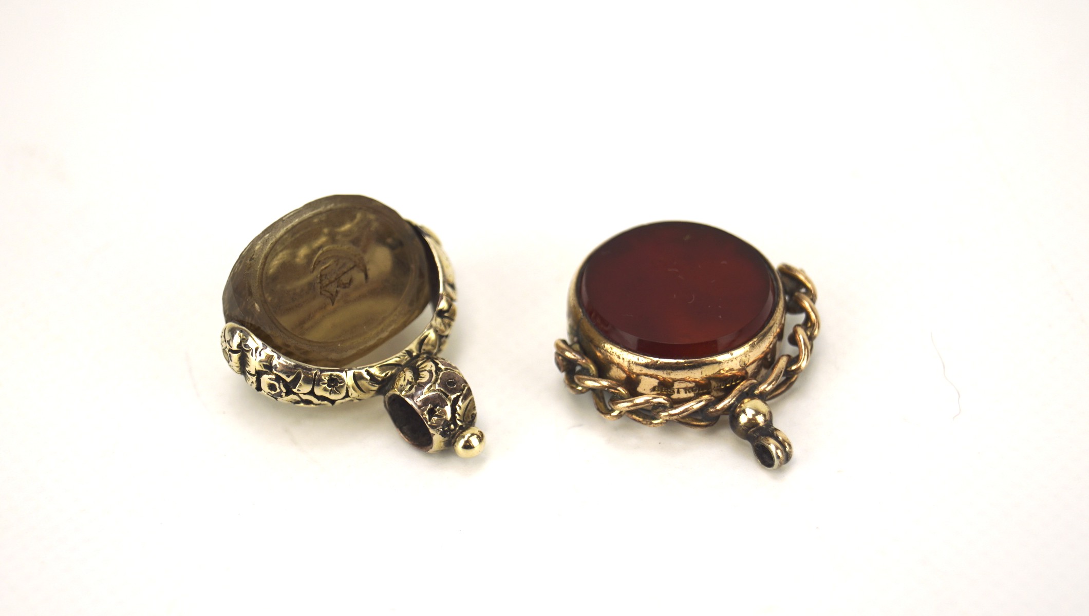 Two early 20th century metal fob/seals, one marked best rolled gold,