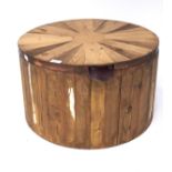 A contemporary pine coffee table storage box, of circular form,