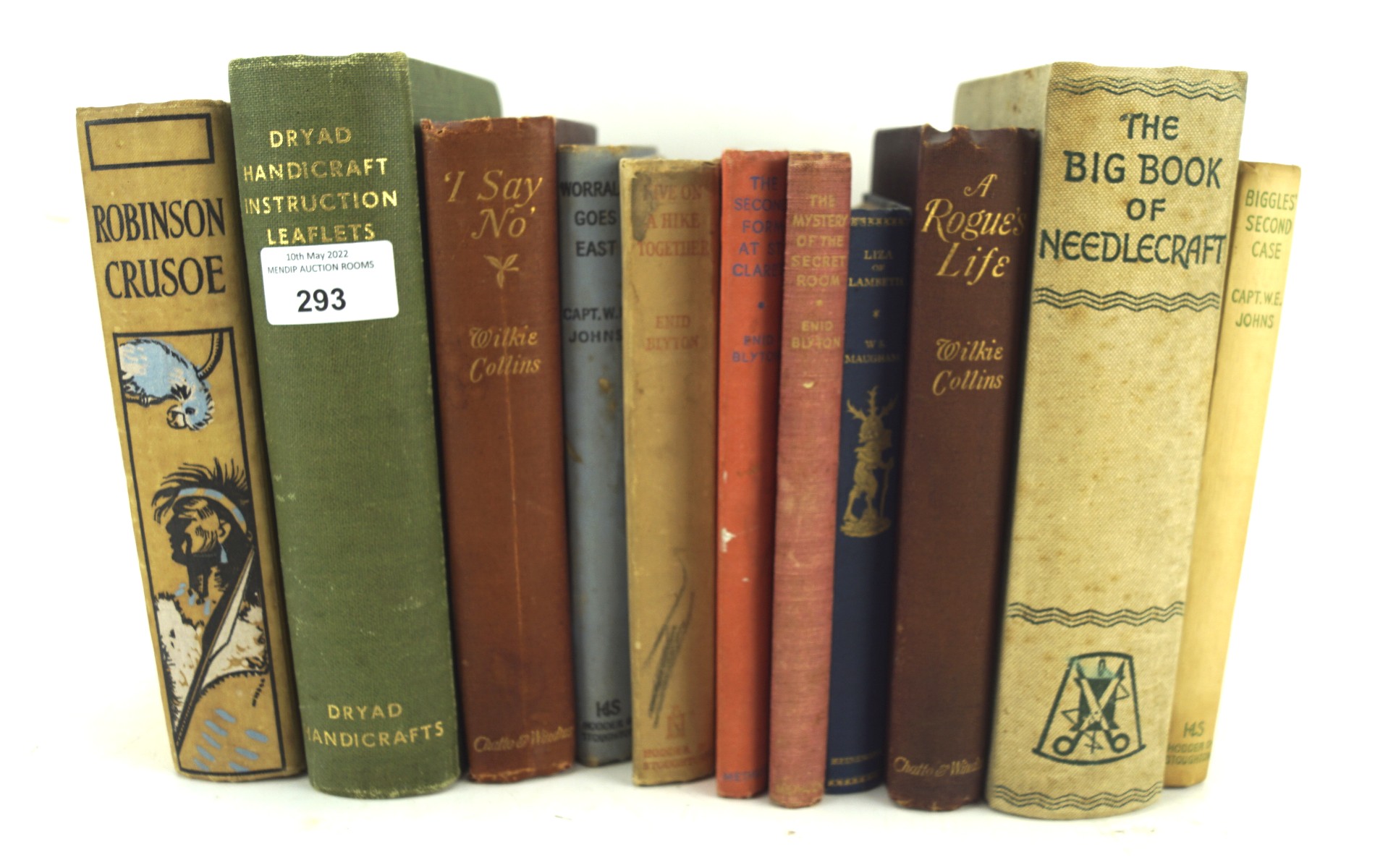 An assortment of volumes, to include 'Robinson Crusoe' by Daniel Defoe,