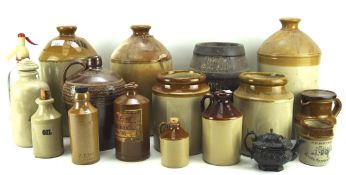 An assortment of stoneware flagons and containers, including Lambeth Morgans Brewery Co Norwich,