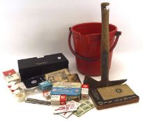 A vintage red fireman's bucket and axe, together with a Boots Pure Drug Co first aid kit,