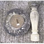 A stone composite sundial with metal dial inscribed 'Time Flies', on a moulded base,