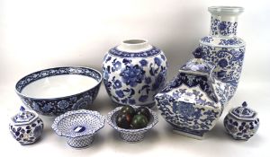 An assortment of contemporary Chinese blue and white ceramics, including vases, lidded pots, a bowl,