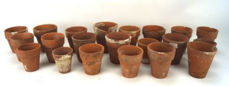 Twenty one vintage small terracotta plant pots,