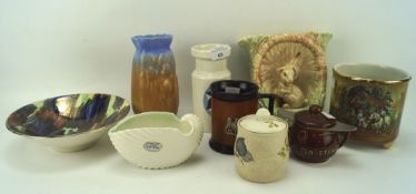 An assortment of Sylvac ceramics, including a rabbit adorned wall pocket vase, a mid-century vase,