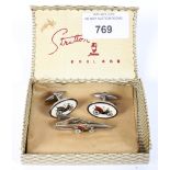 A pair of Stratton cufflinks and a tie pin, enamelled with old motor cars,