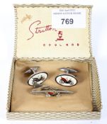 A pair of Stratton cufflinks and a tie pin, enamelled with old motor cars,