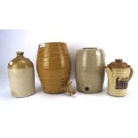 An assortment of stoneware, including a Hilsonia pouring jug, water vessels,